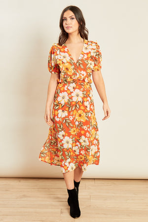 Ladies orange floral dress with puffed sleeves