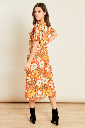 Ladies orange floral dress with puffed sleeves