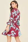 Ladies blue and burgandy ruffle hem wrap dress